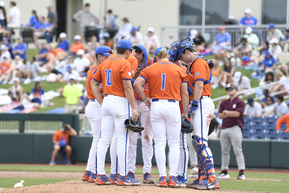 The Florida baseball infield during a mound visit in the team's win over Mississippi State on Sunday, March 31, 2024. 