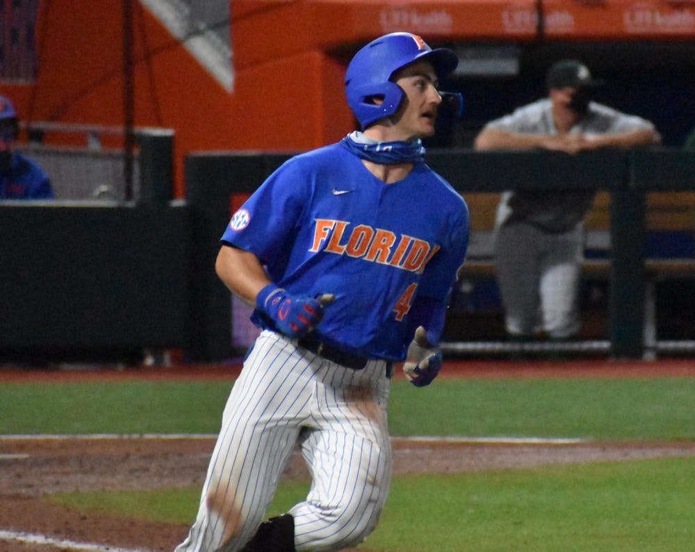 <p>Jud Fabian rounds second base in a game against Jacksonville. March 2021. He passed Mike Zunino for fifth all-time in home runs during his career at UF on Tuesday against Stetson.</p>
