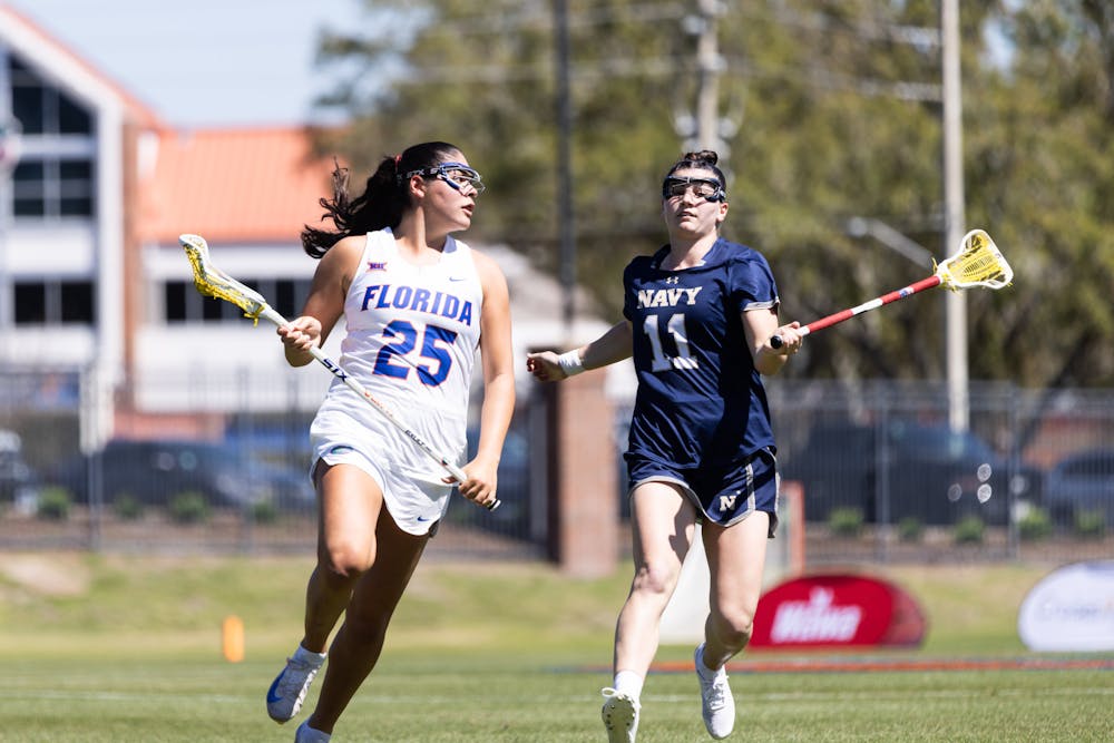 Theresa Bragg (25) plays against Navy on Wednesday, March 12th, 2025.