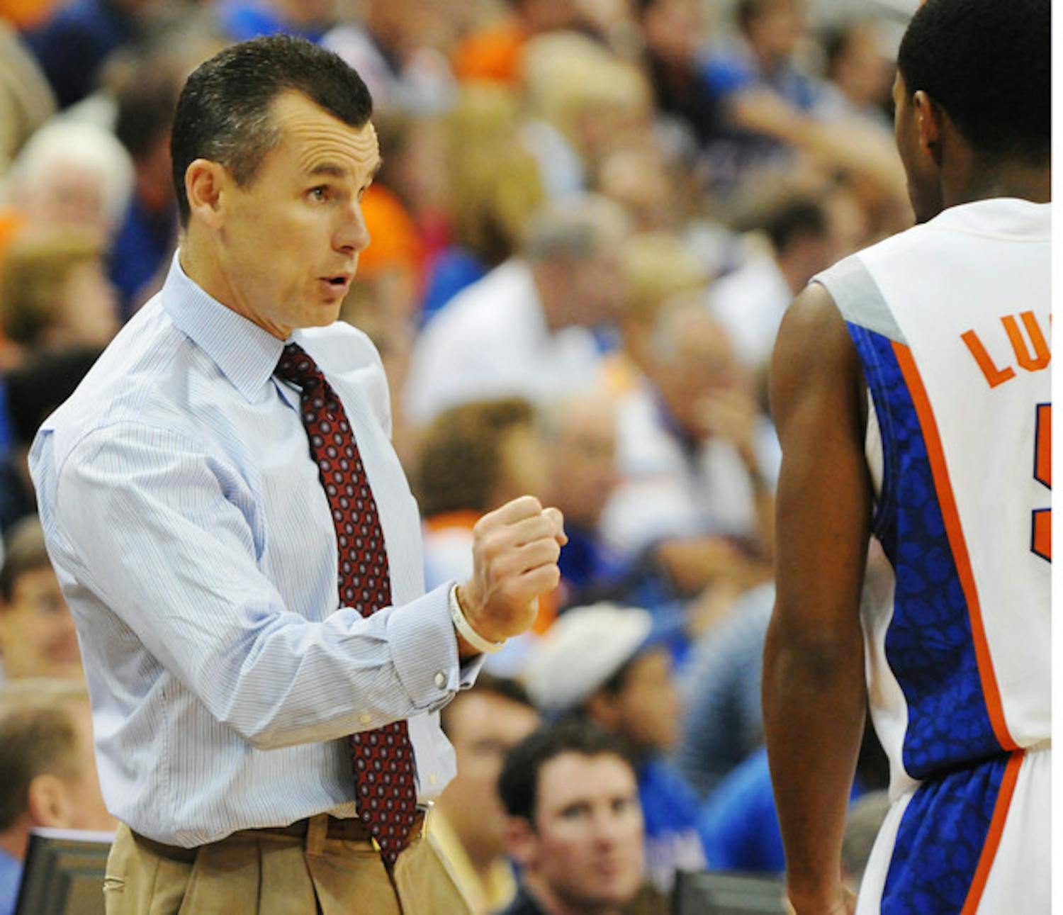 Florida coach Billy Donovan had to talk to his son before confirming an exhibition between UF and his school, Catholic University.