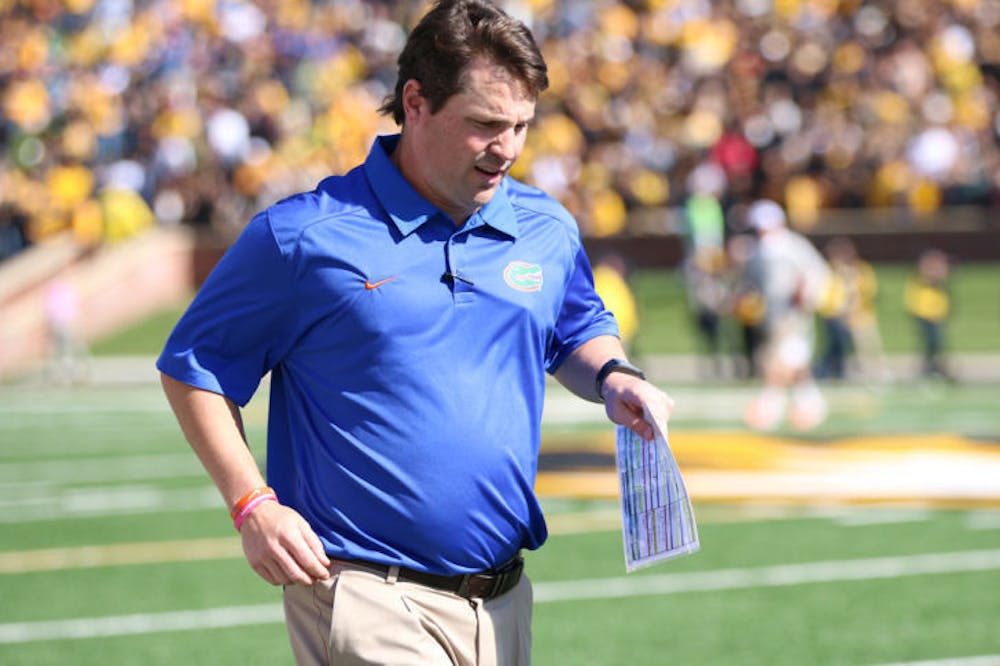 <p>Florida coach Will Muschamp walks off the field following Florida’s 36-17 loss against Missouri on Oct. 19 at Faurot Field in Columbia, Mo. Muschamp is 0-2 against Georgia since taking over at Florida.</p>