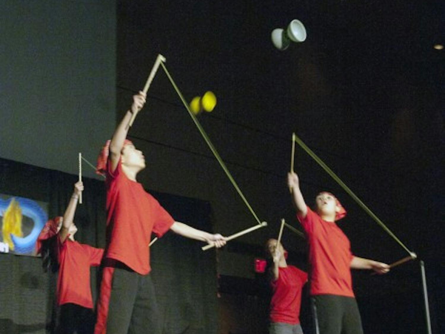 Members of the Gainesville Chinese School perform the Chinese yo-yo Saturday evening at the Chinese American Student Association's Chinese New Year show, "Awaken the Dragon."