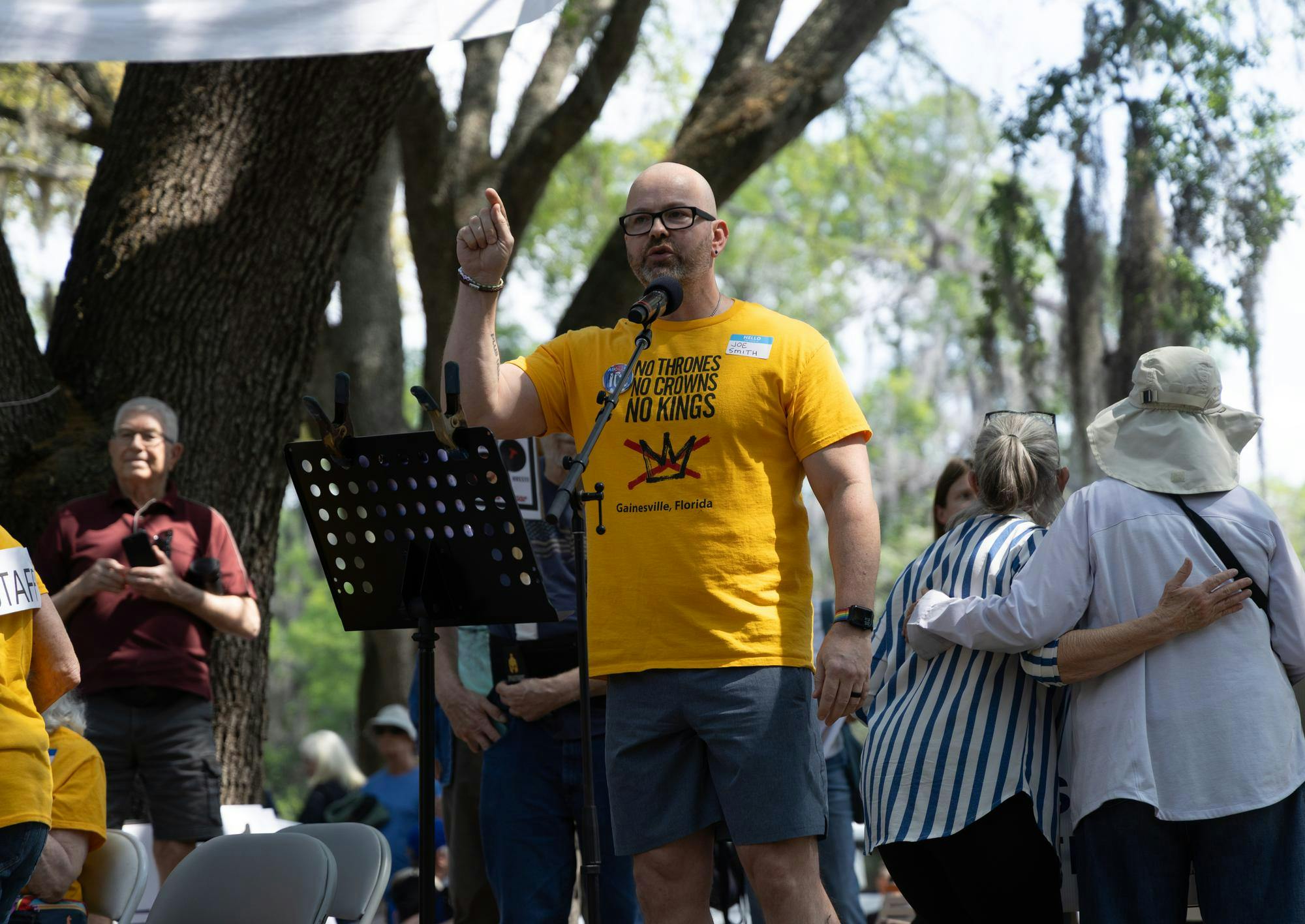 Master of Ceremonies, Joe Smith, gives opening remarks at the No Kings Protest, Saturday, March 28, 2026, at Cora P. Roberson Park in Gainesville, Fla.