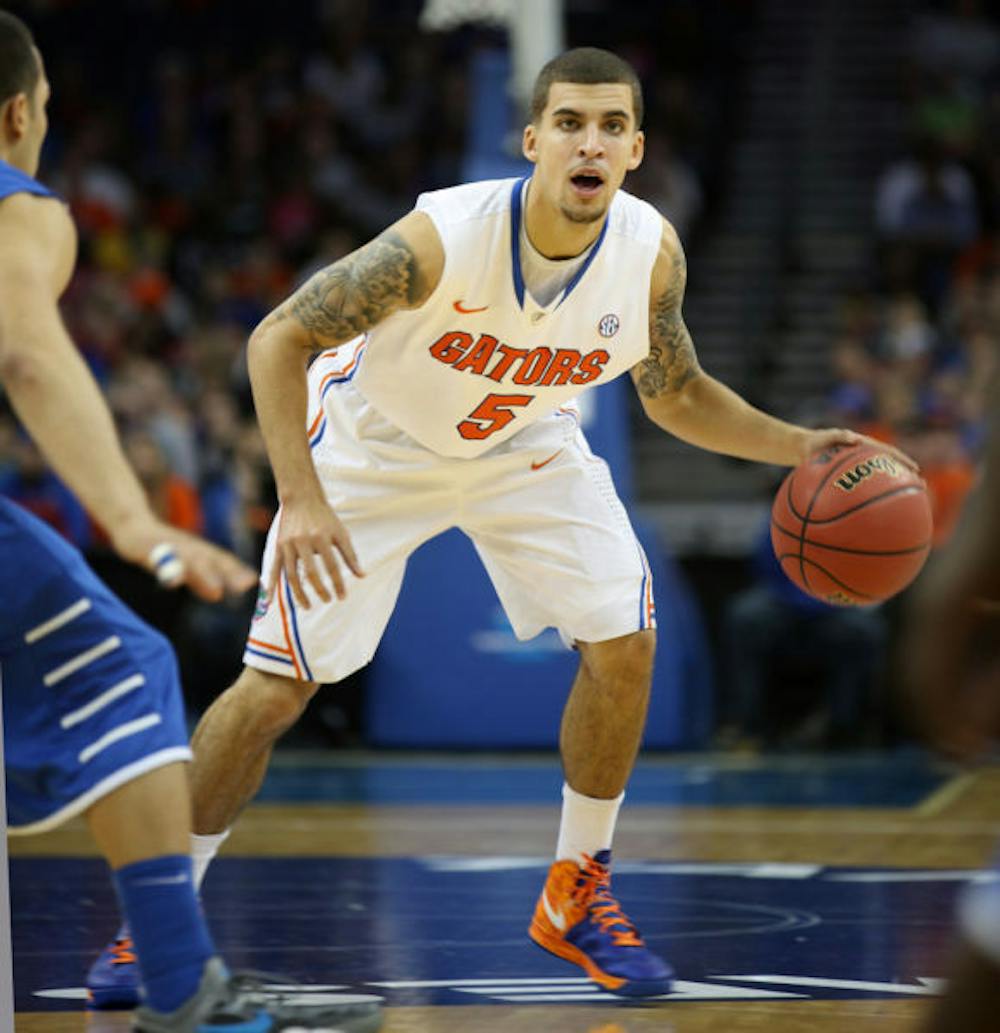 <p>Scottie Wilbekin dribbles the ball during Florida’s 66-45 win against Middle Tennessee on Nov. 18 in the Tampa Bay Times Forum. Florida begins its season against North Florida on Nov. 8.</p>