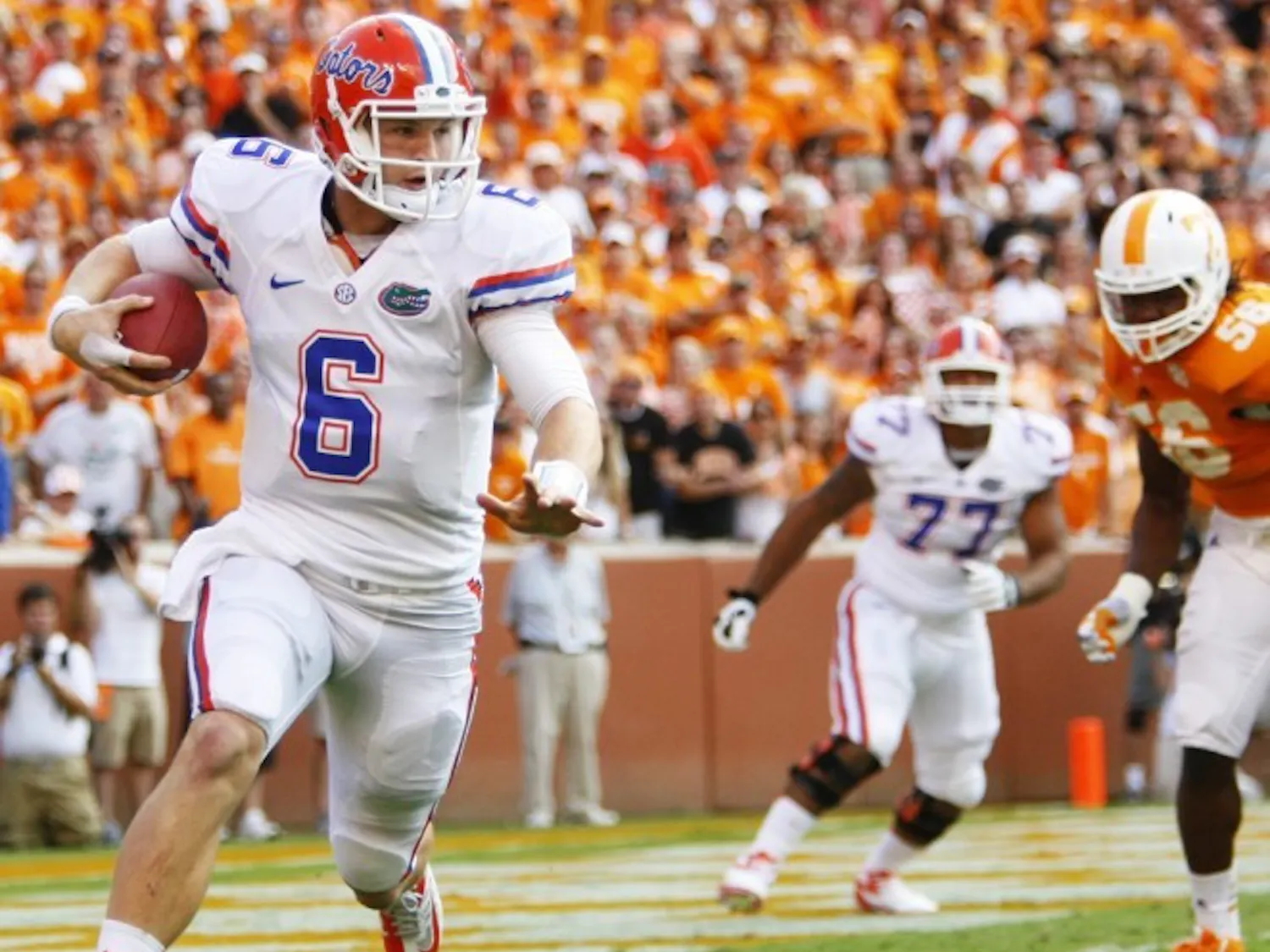 Florida quarterback Jeff Driskel (6) escapes pressure on Saturday during the Gators' 37-20 victory over Tennessee on Saturday at Neyland Stadium.