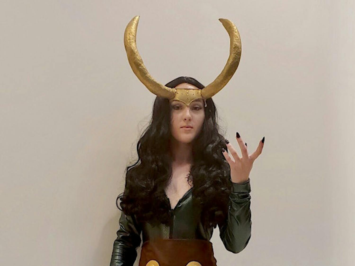 Lady LokiKati Ankrom, 21, resident of Leesburg, Florida, attended SwampCon as a genderbent Thor character, Lady Loki. Gender bending is when someone cosplays a character as its opposite gender.Ankrom has been improving the costume for the past four years. She first cosplayed Lady Loki when she was 18 and felt very proud when she finished the costume in nine months.Most of the cosplay is made out of a latex bodysuit and is not breathable, according to Ankrom.“These horns I’ve had for like three years,” she said. “I refuse to get rid of them.”She advises first-time cosplayers to not make the costume harder than it needs to be.“You will get better eventually,” she said. “Just start at the beginning and work your way up.”