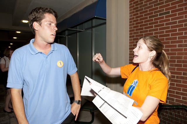 Andrew Hart, Students Party president, and Gillian Leytham, a law student and member of the Students Party, talk about election results in District E, which had 535 voters this year but only 65 voters last year.