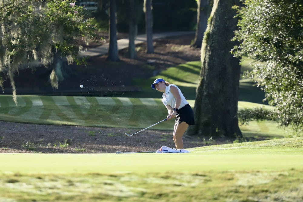 Senior Lauren Waidner hits a ball up into the air at Mark Bostick Golf Course. She was awarded with the East Lake Foundation’s Tom Cousins Award.
