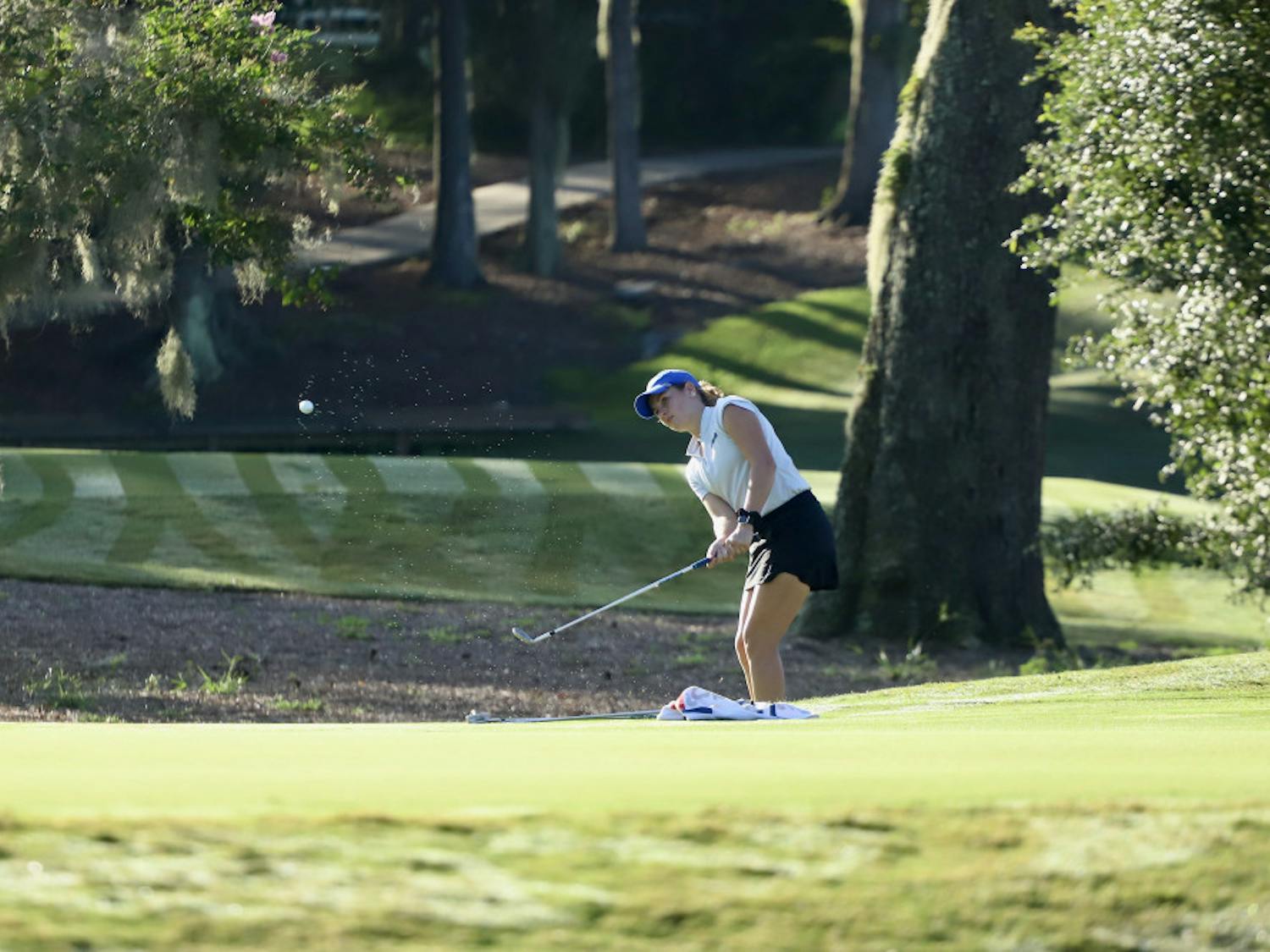 Senior Lauren Waidner hits a ball up into the air at Mark Bostick Golf Course. She was awarded with the East Lake Foundation’s Tom Cousins Award.