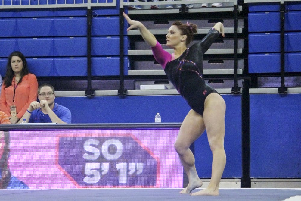 <p>Bridget Sloan performs a floor routine during Florida's win against LSU last season.</p>