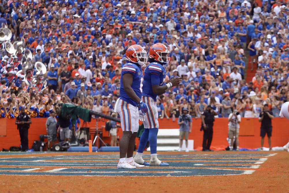 Florida's Emory Jones and Nay'Quan Wright stand in the backfield before they began a 99-yard drive against Alabama during a 31-29 loss on Sept. 18