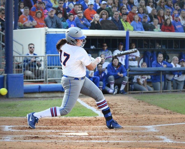 Sophomore Lauren Haeger swings and misses against FSU at Katie Seashole Pressly Stadium on March 27. Haeger went 0 for 2 in Florida’s 3-0 loss to Texas in the Women’s College World Series on Sunday.