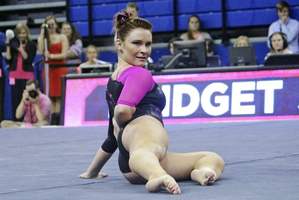 <p>Bridget Sloan performs a floor routine during Florida's win against LSU last season. Sloan injured her ankle while performing her floor exercise in UF's 196.925-193.700 win against Ball State on Sunday.</p>