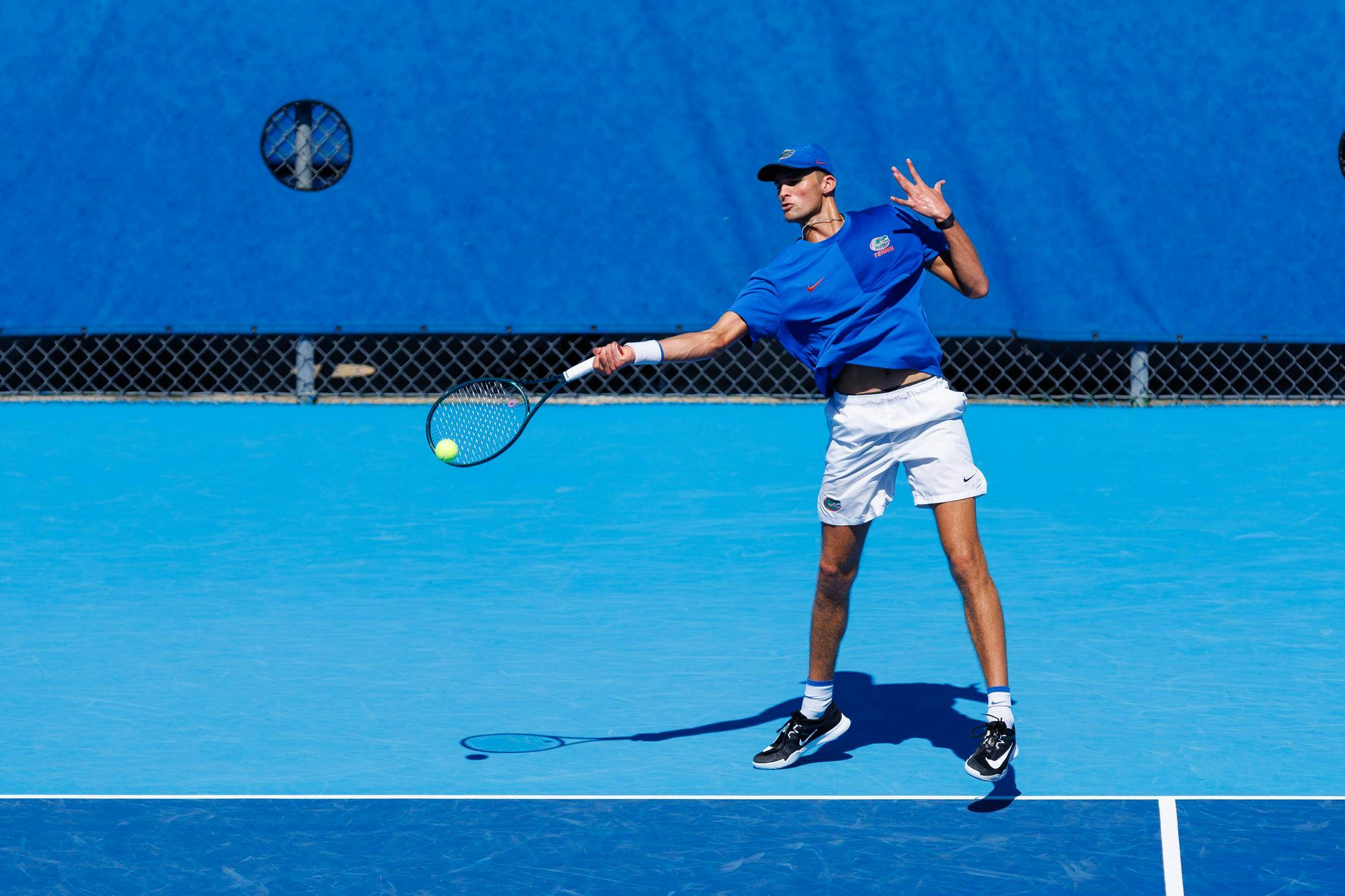 Florida tennis player Henry Jefferson returns the ball during an NCAA tennis match against South Carolina, Sunday, March. 1, 2026, in Gainesville, Fla.