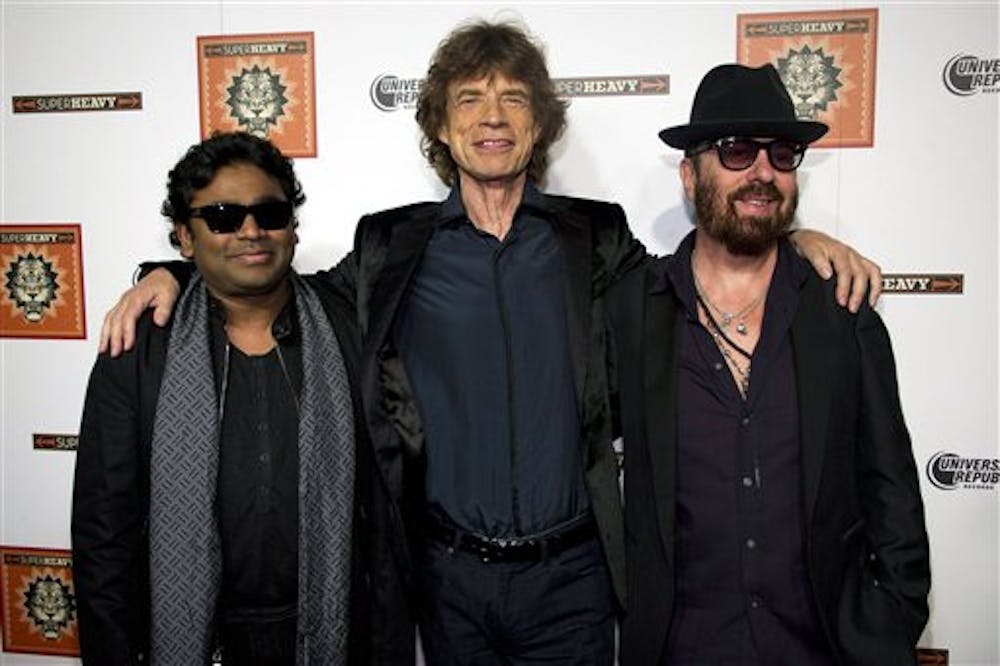 <p style="text-align: center;">Bollywood composer A.R. Rahman</p>
<p>(left) poses with Mick Jagger and Dave Stewart at a release party</p>
<p>for the debut album of their supergroup, SuperHeavy. Rahman</p>
<p>produced the recently released and well-praised soundtrack for the</p>
<p>film “Rockstar.”</p>