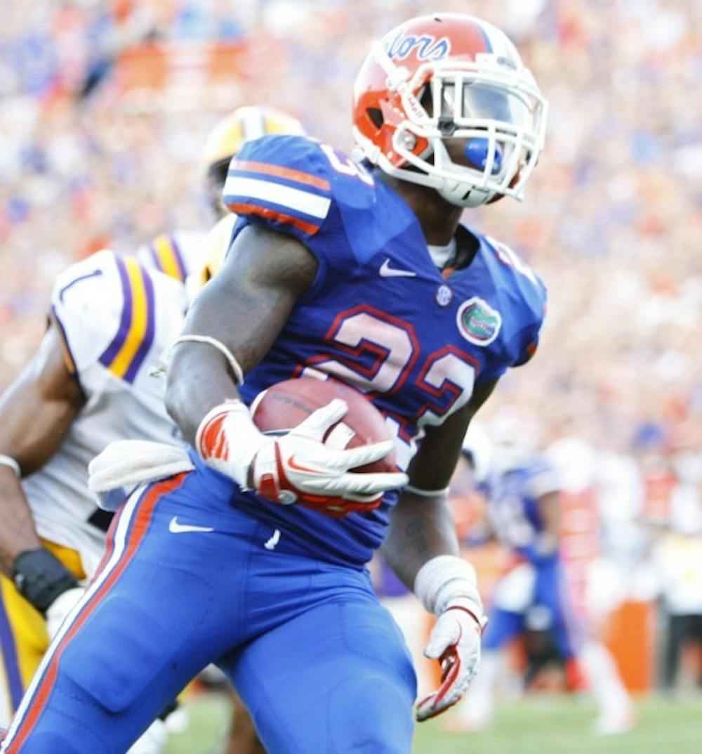 <p>Senior running back Mike Gillislee sprints into the end zone untouched during UF’s 14-6 victory against LSU on Saturday at Ben Hill Griffin Stadium. Gillislee totaled 146 rushing yards and two touchdowns on 34 carries against the Tigers.</p>