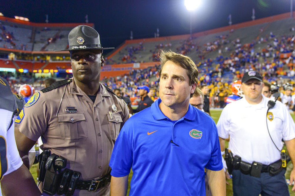 Will Muschamp walks off the field following Florida's 42-13 loss to Missouri on Oct. 18.