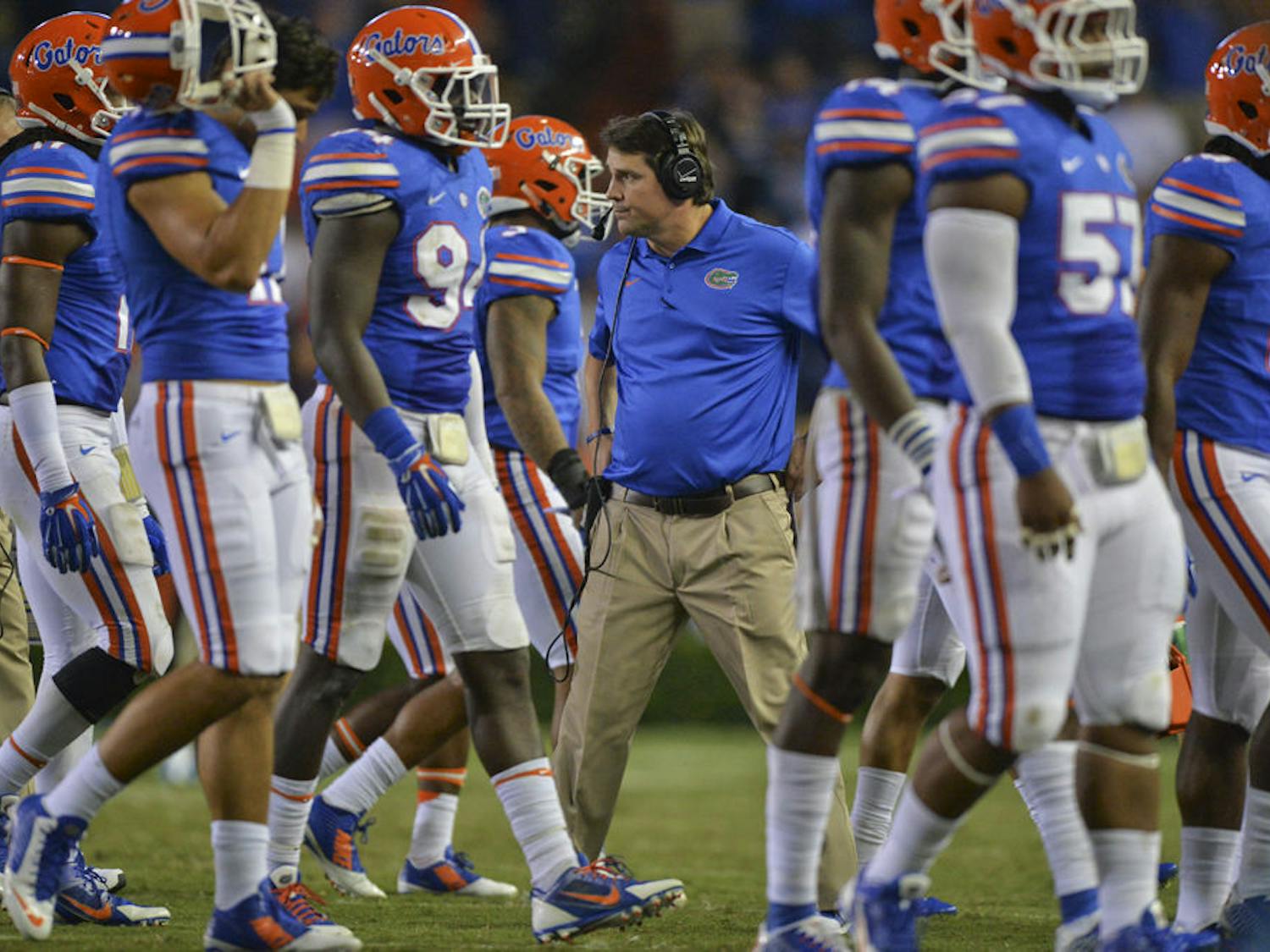 Coach Will Muschamp breaks from a huddle during Florida's 42-13 loss to Missouri on Oct. 18.