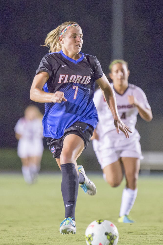 Savannah Jordan dribbles the ball during Florida's 2-1 win against Georgia  at James G. Pressly Stadium.