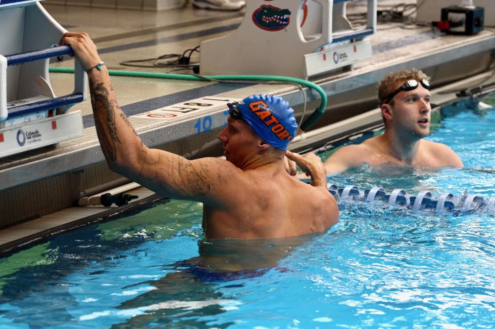<p>Caeleb Dressel won the 200 fly Saturday afternoon against FAU. His win was one of seven consecutive victories for the men's team to start the event. </p>
