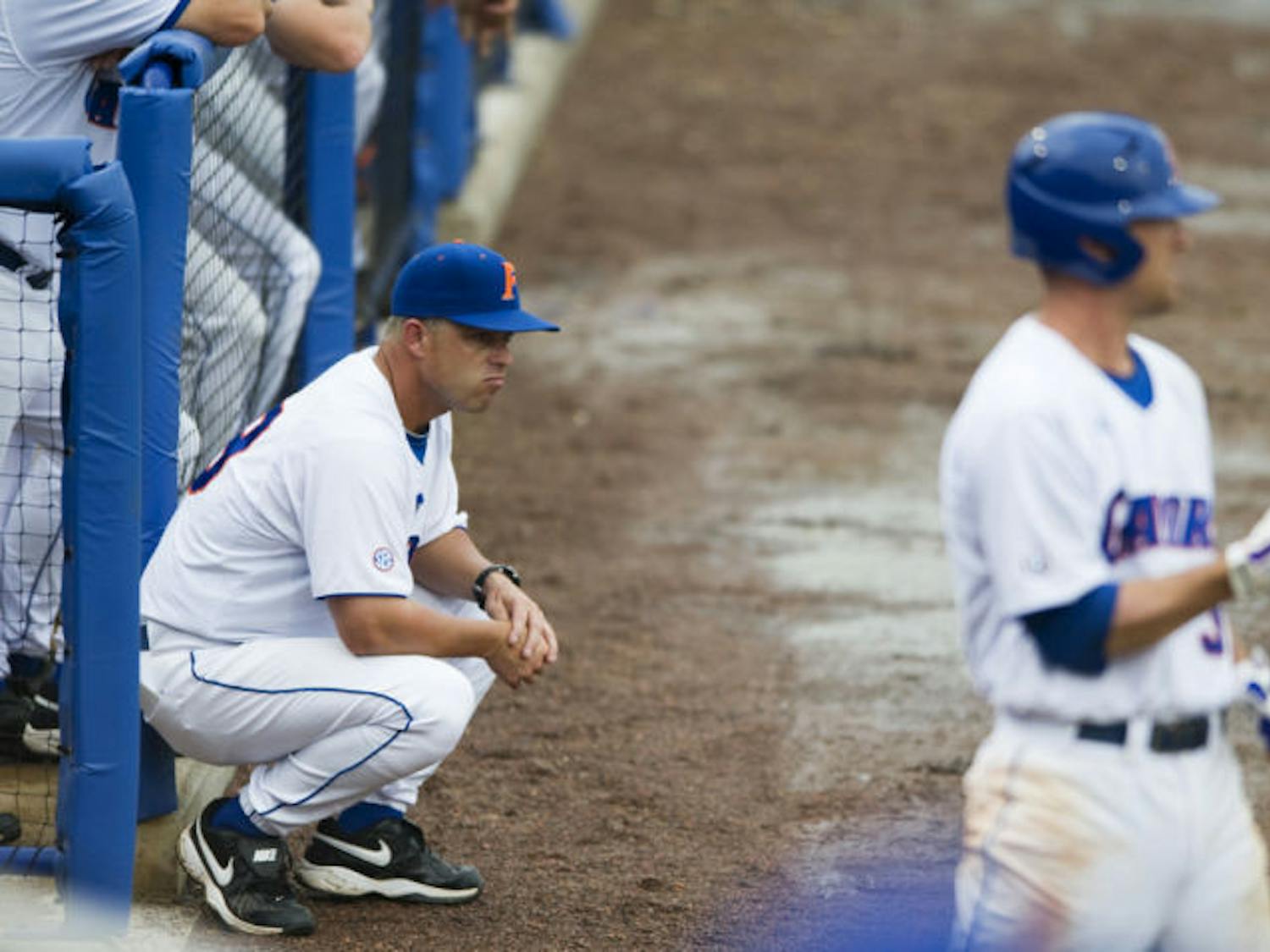 UF coach Kevin O'Sullivan watches from outside the dugout during the Gators' 9-7 loss to Southern Miss. in game one of NCAA Super Regional play in McKethan stadium Saturday, June 6, 2009. O'Sullivan and the Gators were eliminated from the 2014 NCAA Tournament in the regional round on Saturday.