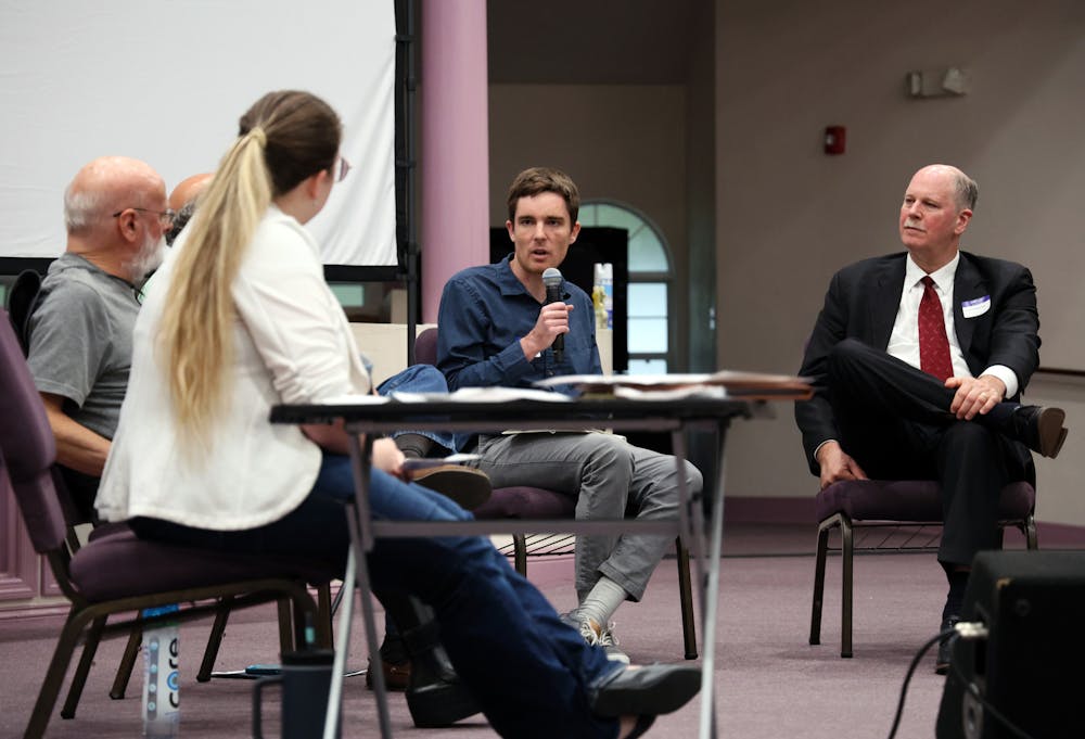 Dr. Robert Ainsworth, an assistant professor of economics at the University of Florida, answers a question about Trump’s budget bill at a “Just the Facts” town hall at Upper Room Ministries on Thursday, June 26, 2025.