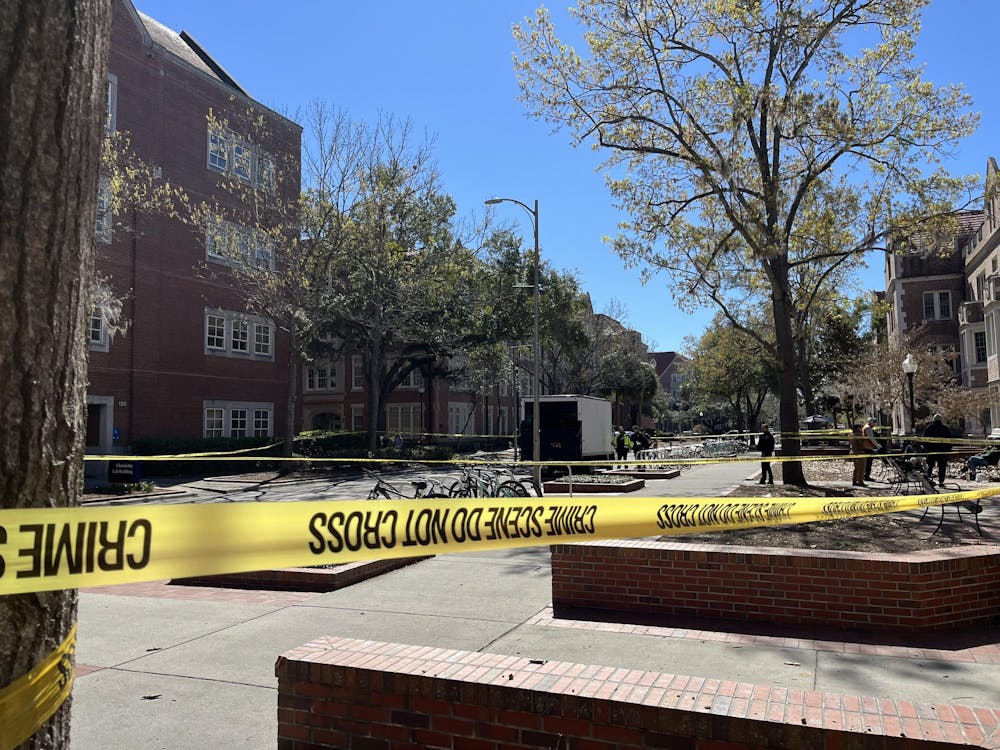 Gainesville Police Department officers investigate a pedestrian crash by Buckman Hall on campus on Monday, Feb. 23, 2026 in Gainesville, Fla.