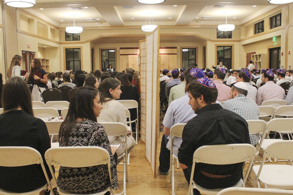 <p>The Lubavitch-Chabad Jewish Student and Community Center hosted full Yom Kippur services Sept. 22, 2015, for students and the local community. As the services proceeded, a steady stream of people continued to file into the center for services and prayer for Judaism’s holiest day of the year.</p>