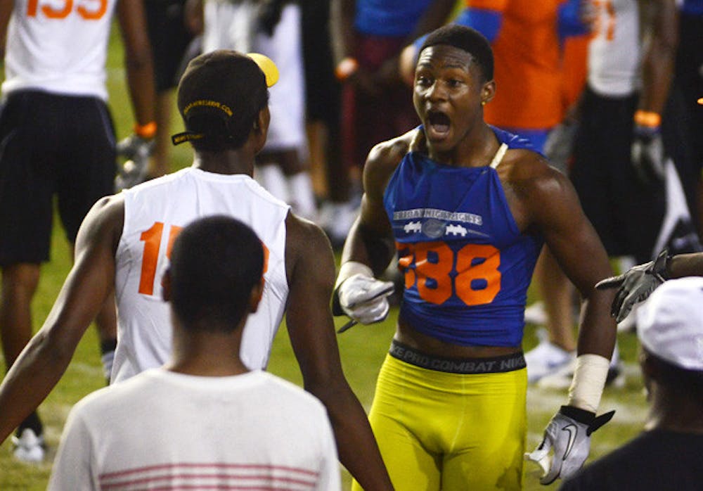 <p>Stefon Diggs (right) steamrolled the competition at Florida’s Friday Night Lights. The five-star wideout flashed a Gator chomp after catching a TD on his first route.&nbsp;</p>