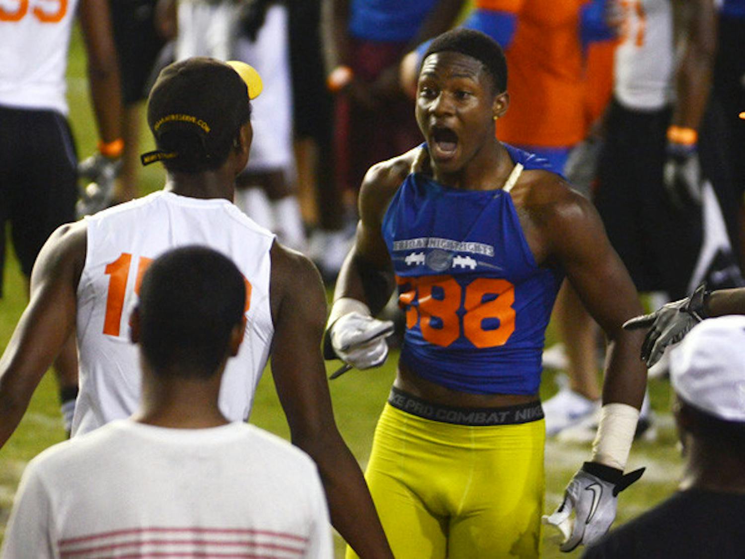 Stefon Diggs (right) steamrolled the competition at Florida’s Friday Night Lights. The five-star wideout flashed a Gator chomp after catching a TD on his first route.&nbsp;