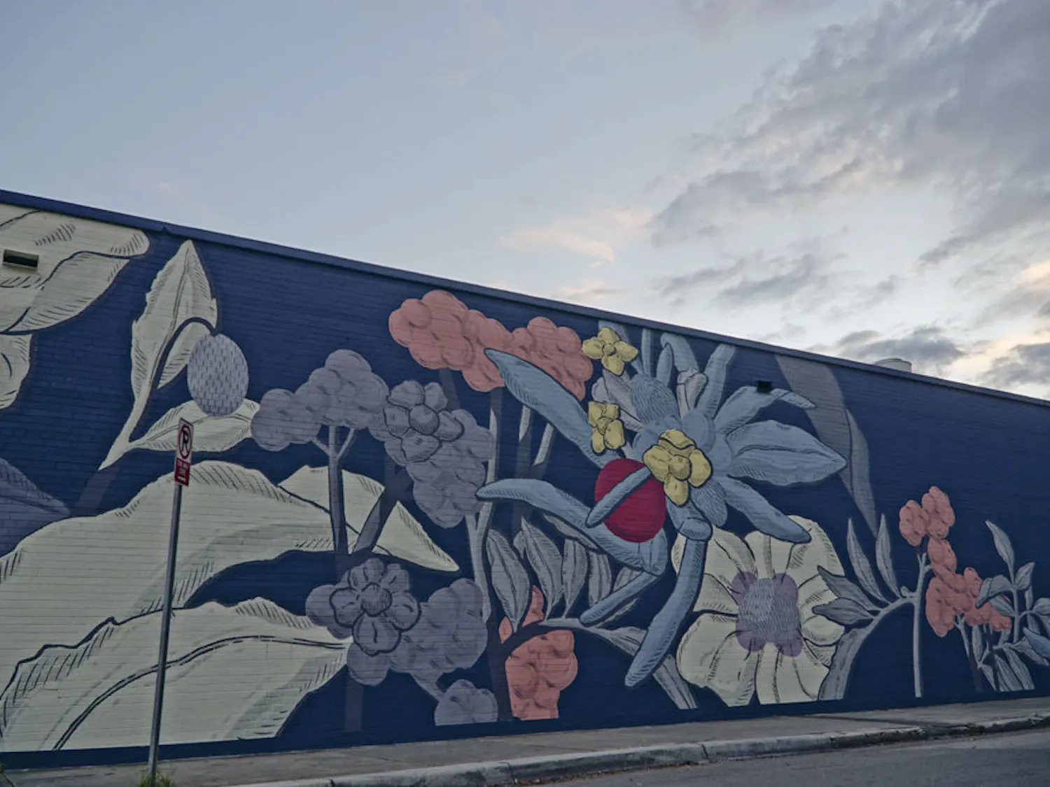 A mural in the 352Walls Project decorates the north wall of The Top, facing Northwest First Avenue, on Dec. 3, 2015.