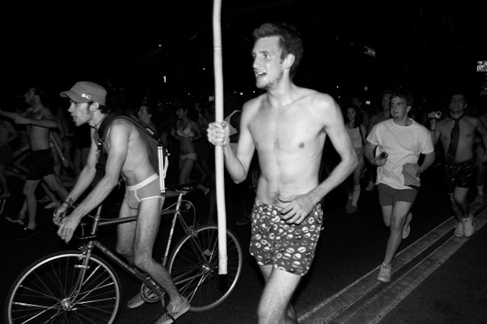 <p>Scantily-clad students run through the streets of the UF campus as part of The Great Underwear Dash.</p>