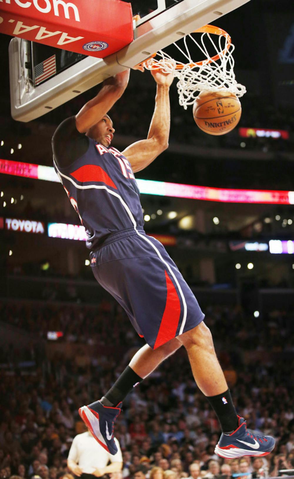 <p>Atlanta Hawks' Al Horford dunks against the Los Angeles Lakers during the first half the Hawks' 91-86 win over the Lakers on Sunday in Los Angeles.</p>