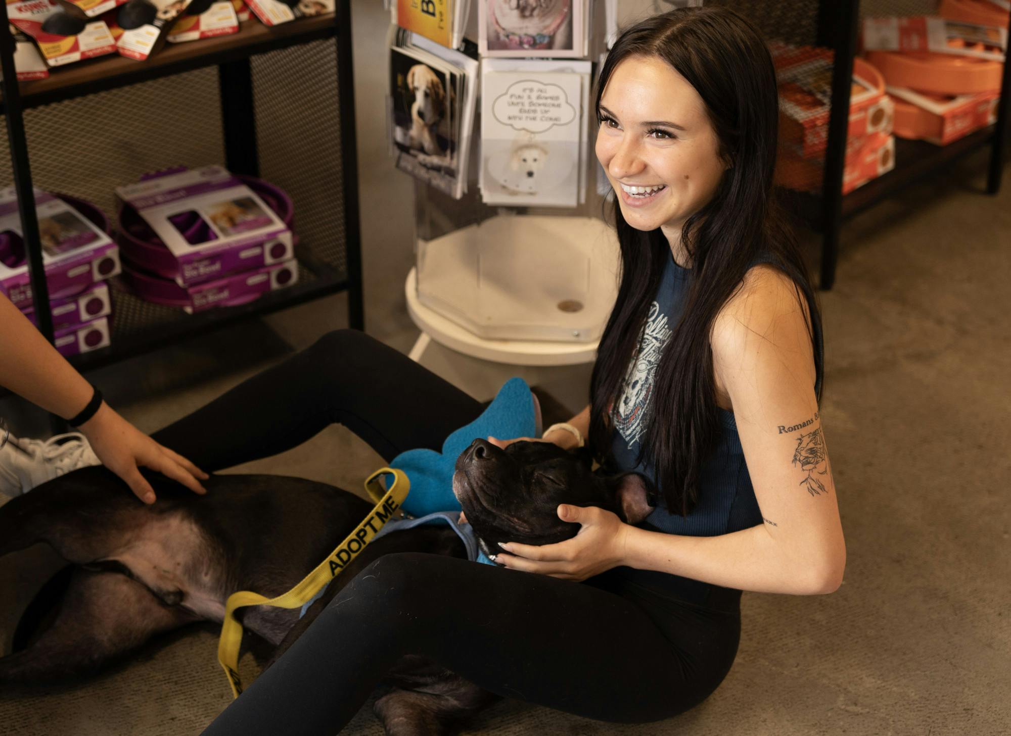 Sante Fe student Ava Sardina plays with shelter-dog Jake at Camp Run-A-Mutt on Friday, Sept. 1, 2023. Ava took Jake home hoping to give him a forever home. 