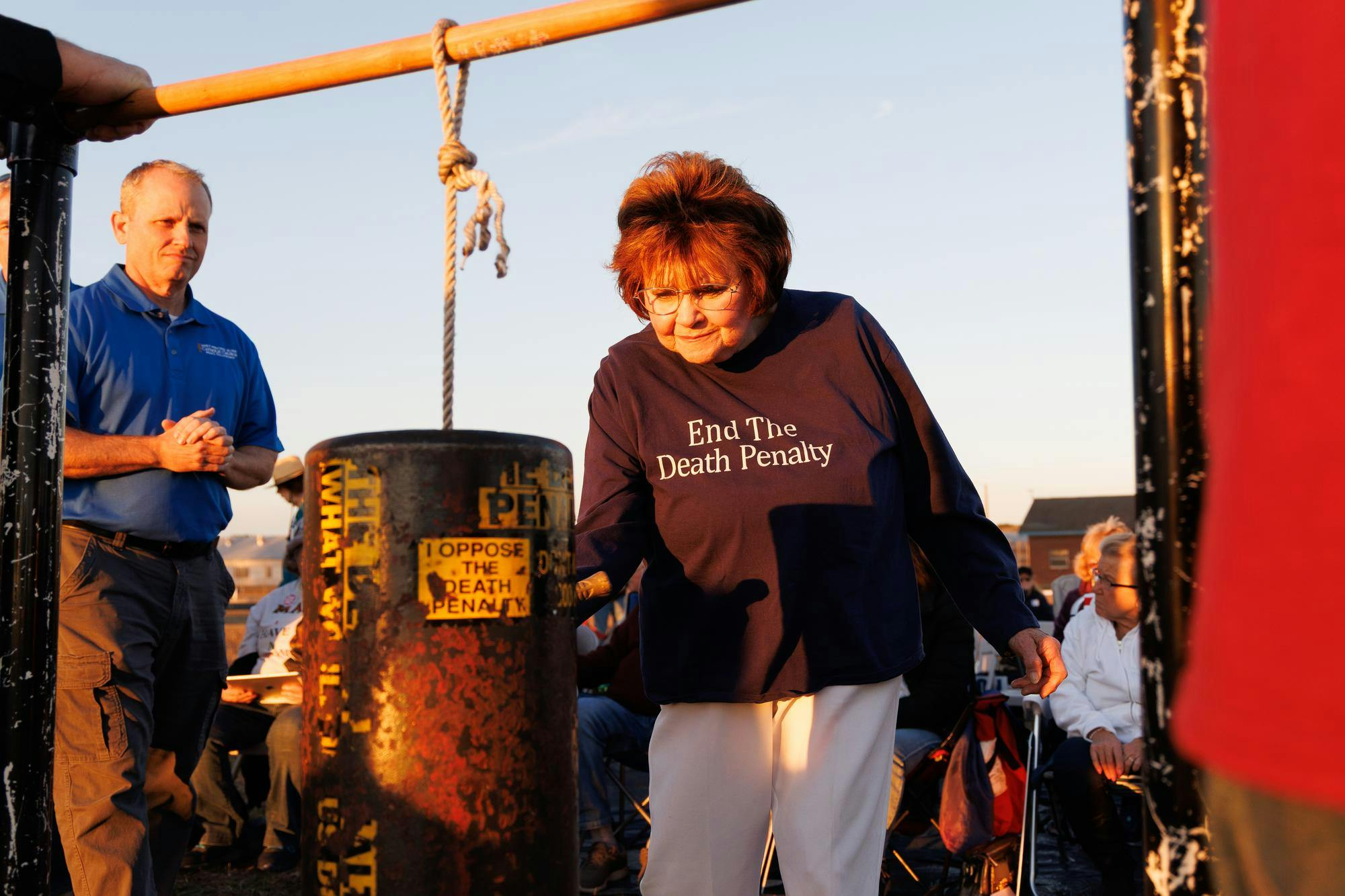 Marsha Lyons bangs a metal cylinder with a hammer in opposition to the execution of Ronald Palmer Heath. Heath was executed at the Florida State Prison in Raiford on Tuesday, Feb. 10, 2026.