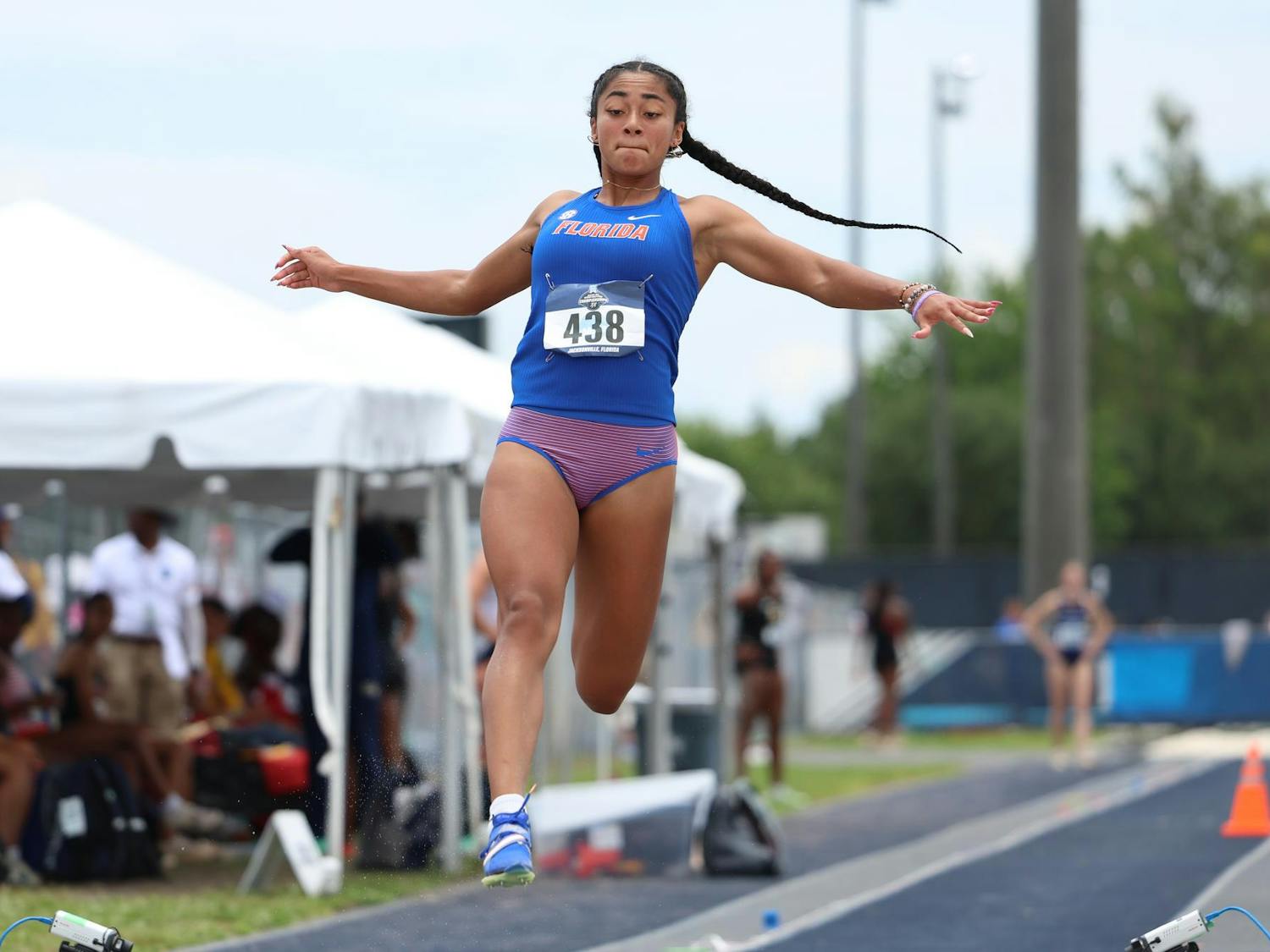 Alyssa Banales leaps during the NCAA East Regionals on Thursday, May 29, 2025 at Hodges Stadium in Jacksonville, Florida
