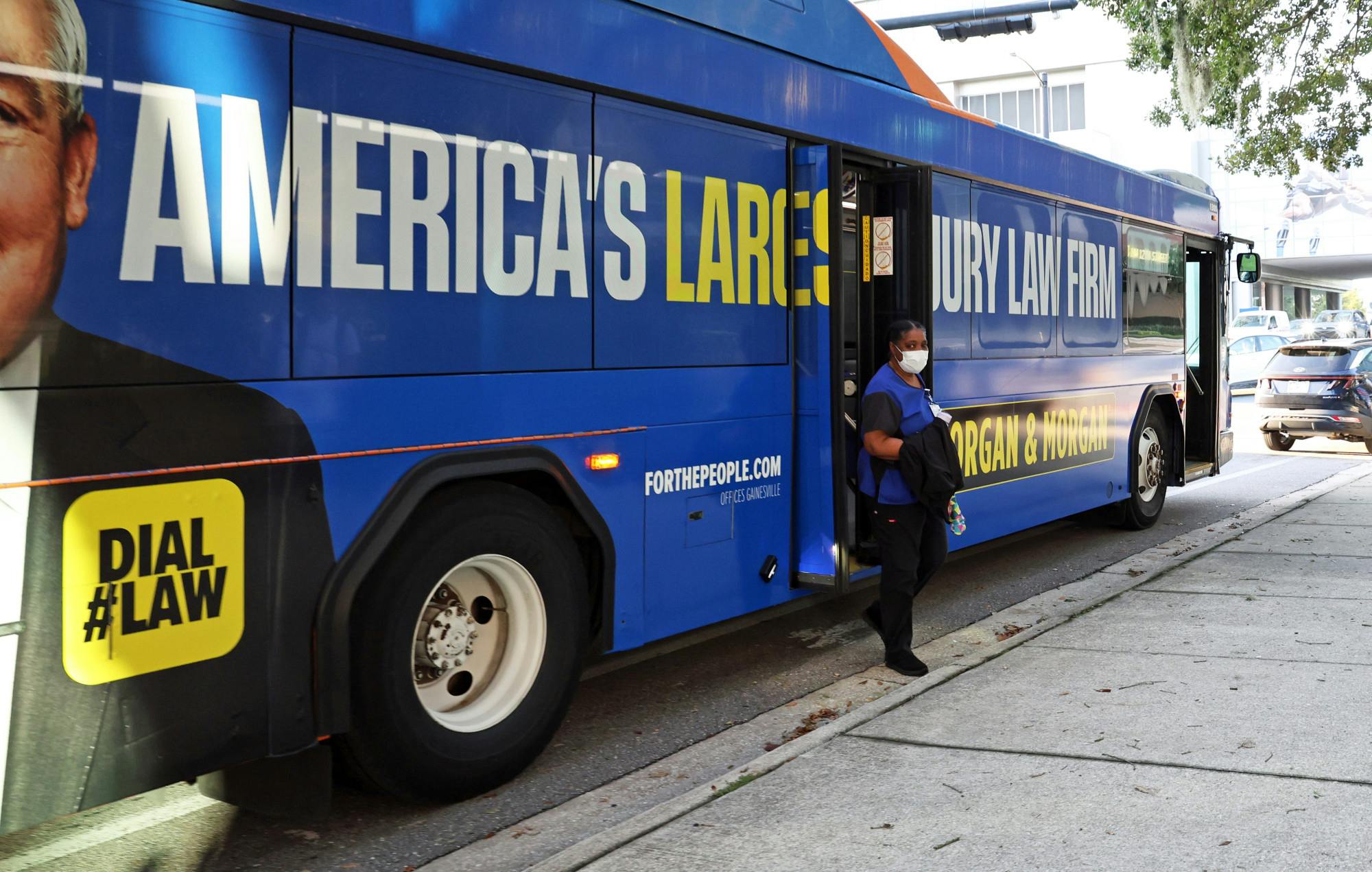 An employee at UF Health Shands Children’s Hospital steps off an RTS bus on her way to work on Thursday, July 17, 2025.
