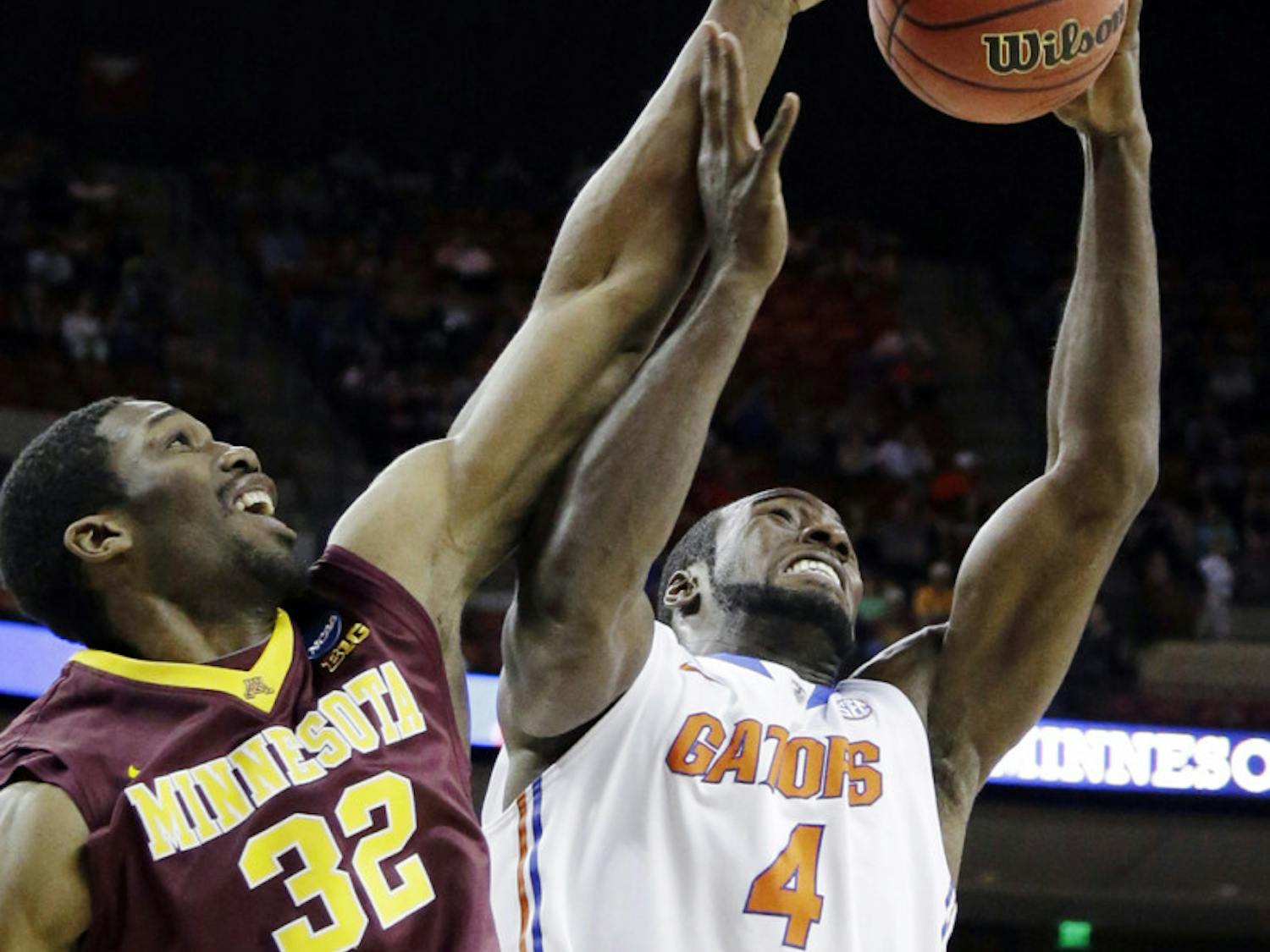 Center Patric Young pulls down a rebound during Florida’s 78-64 win against Minnesota on March 24 in Austin, Texas. Young had surgery to remove a bone spur in his right ankle on Friday.