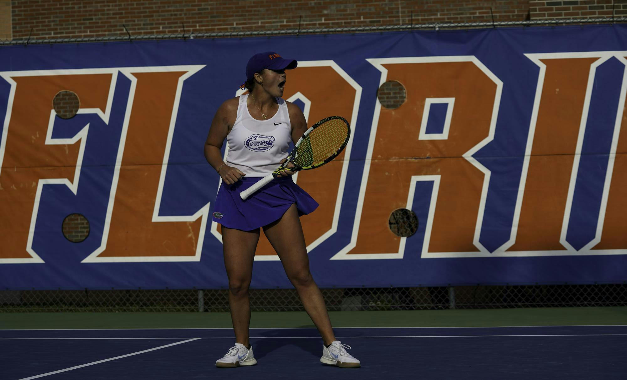Reagan Parker celebrates after scoring against her University of Arkansas opponent at Alfred A. Ring Tennis Complex on Friday, March 28, 2025. Jimena Gomez Alonso of University of Arkansas defeated Parker 6-3 and 6-0.