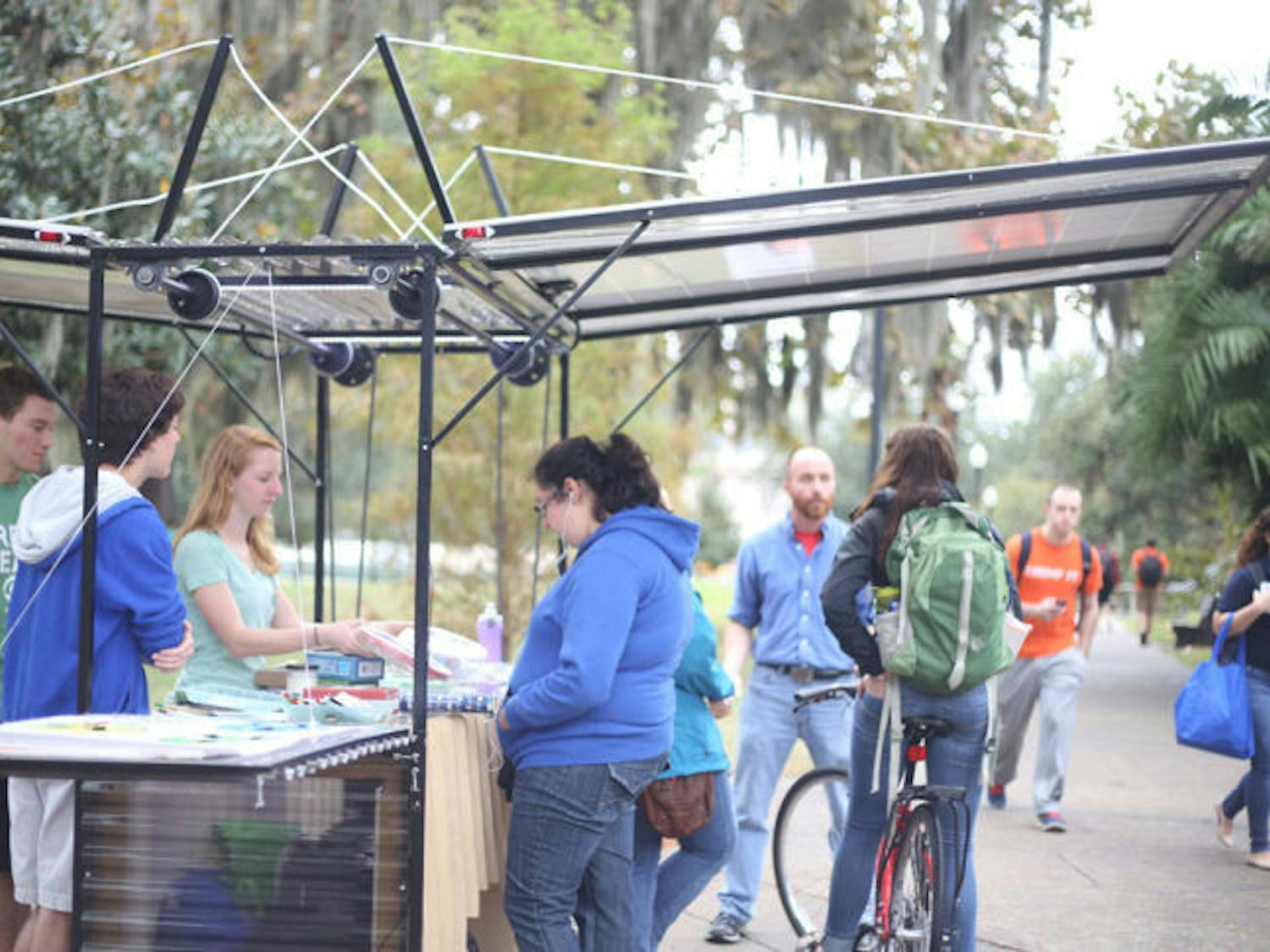Sustainable UF has a new solar-powered hut, used to play games with students and educate them about environmental sustainability. The hut is made of reclaimed wood and locally sourced steel and pulled by a bike.