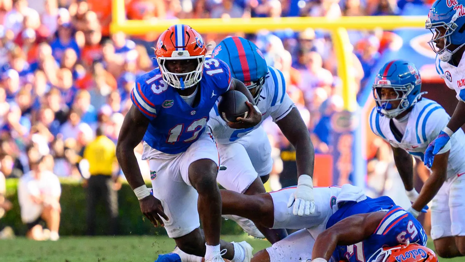 Florida running back Jadan Baugh (13) runs to the end zone during the first half of an NCAA college football game against Ole Miss, Saturday, Sept. 26, 2026, in Gainesville, Fla.