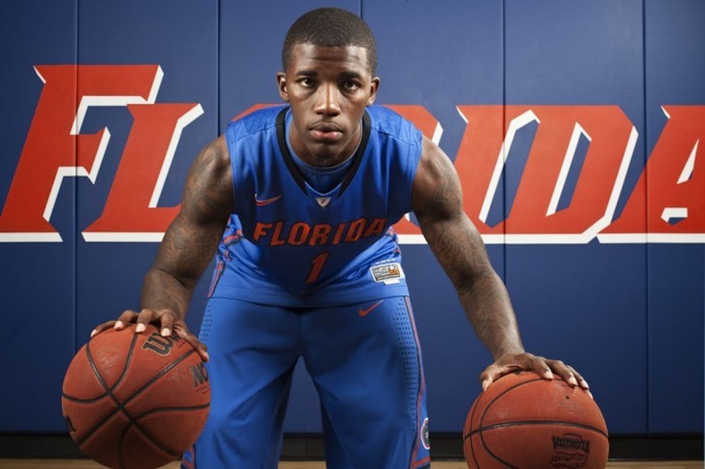 <p>Senior Kenny Boynton poses during media day on Oct. 10. Boynton wants to help his NBA chances by playing point guard in 2012.&nbsp;</p>