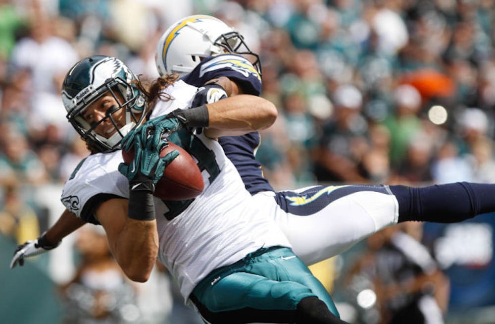 <p>Philadelphia Eagles wide receiver Riley Cooper (14) catches a touchdown pass from quarterback Michael Vick during the second quarter of a 33-30 loss to the San Diego Chargers on Sunday in Philadelphia. Cooper had two catches for 25 yards in the game.</p>