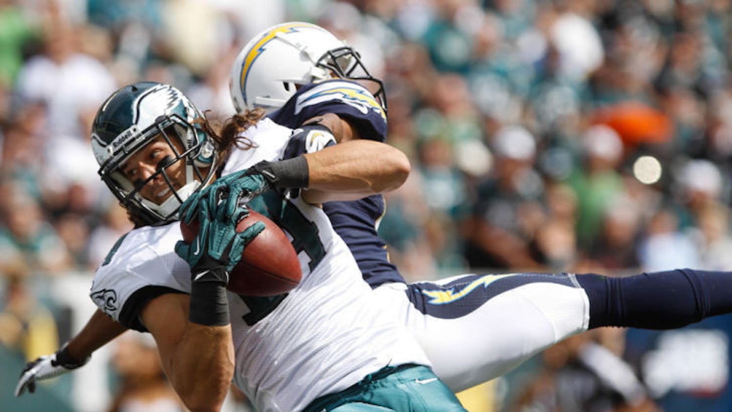 Philadelphia Eagles wide receiver Riley Cooper (14) catches a touchdown pass from quarterback Michael Vick during the second quarter of a 33-30 loss to the San Diego Chargers on Sunday in Philadelphia. Cooper had two catches for 25 yards in the game.