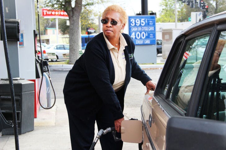 Janet Blakney, a 59-year-old Regional Transit System bus driver, pays $3.95 a gallon of regular unleaded gasoline at the Citgo at the corner of North Main Street and Northeast Eighth Avenue.