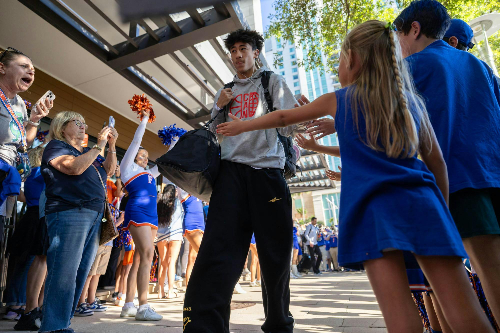 Florida guard Xaivian Lee walks through GatorWalk, Sunday, March 22, 2026, in front of the JW Marriott, in Tampa, Fla.