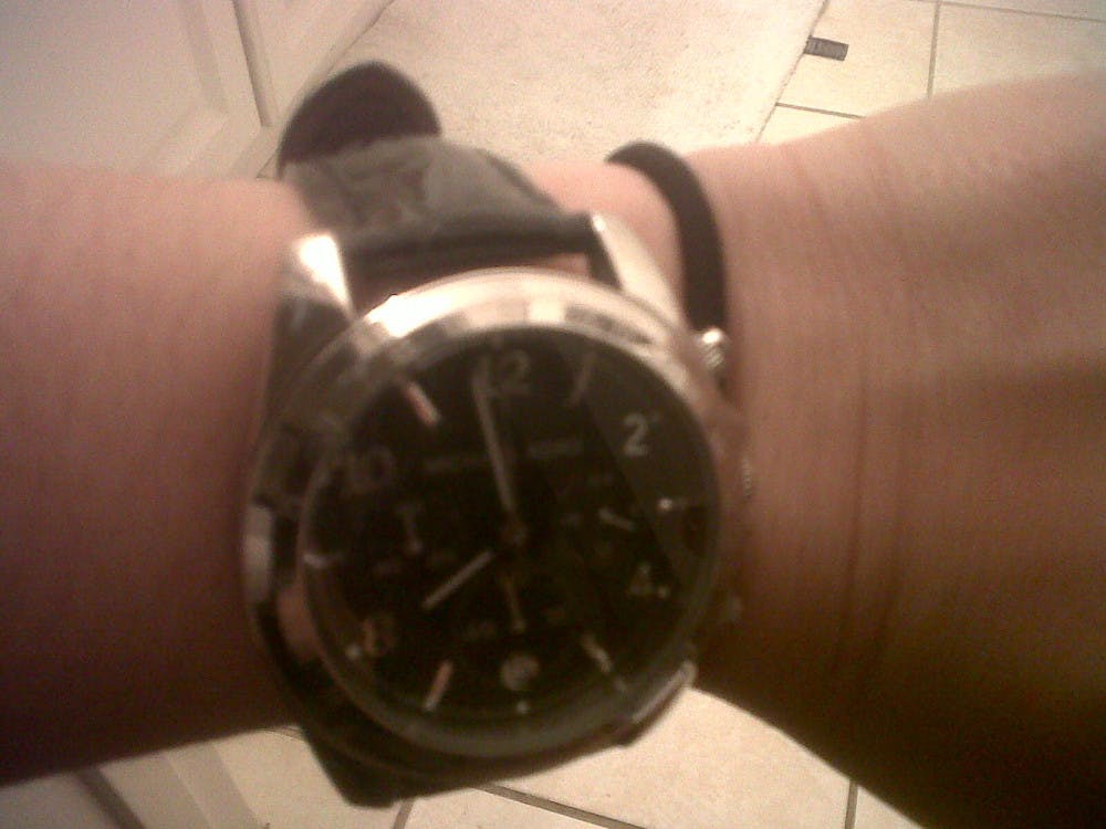 My oversized Michael Kors crocodile-embossed leather black watch