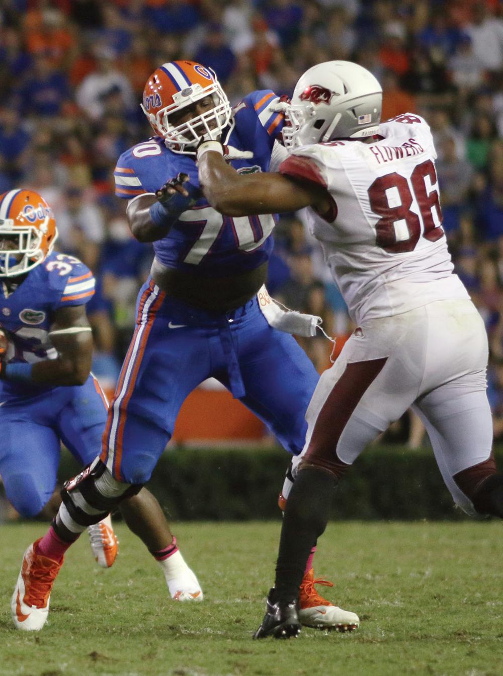 <p>D.J. Humphries blocks an Arkansas defensive lineman during Florida’s 30-10 win against Arkansas on Oct. 5 in Ben Hill Griffin Stadium.</p>