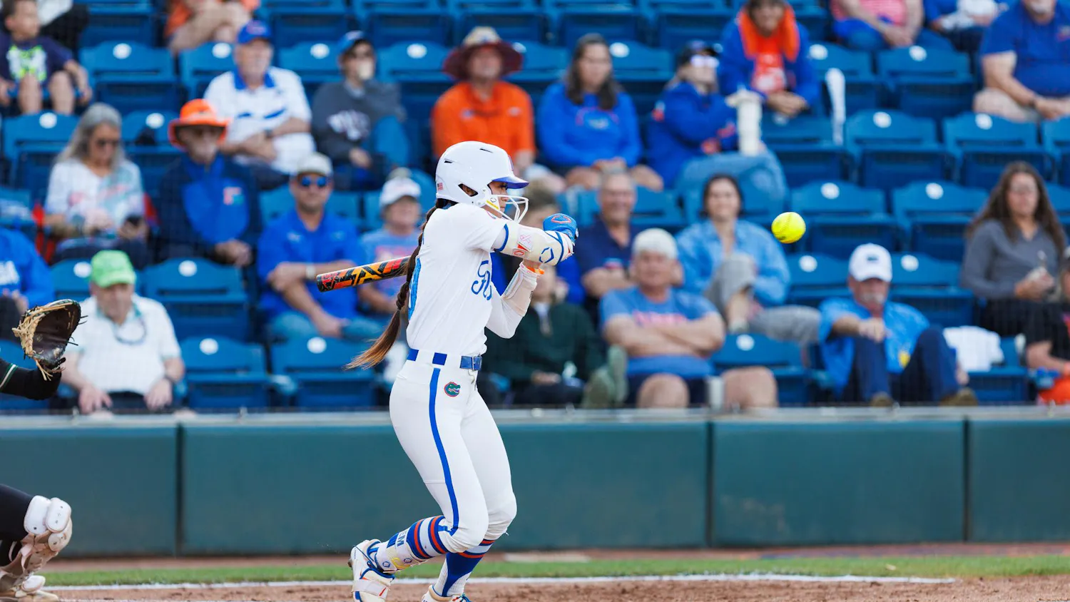Florida Gators infielder Gabi Comia swings during an NCAA softball game against Stetson, Wednesday, March 25, 2026, in Gainesville, Fla.