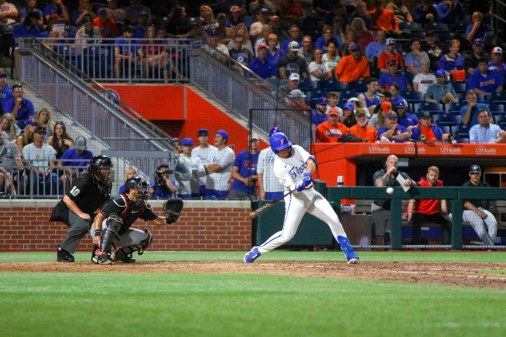 Florida second baseman Cade Kurland hits a grand slam during the Gators' 13-11 loss to the Georgia Bulldogs Friday, April 14, 2023.